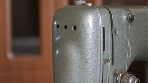 Works on retro sewing machine Stock Footage 87216221