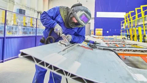 Workshop for assembling metal frames for subway cars, trams and trains. Stock Photos