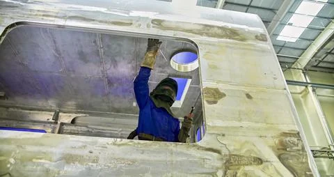 Workshop for assembling metal frames for subway cars, trams and trains. Stock Photos