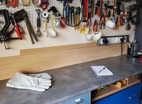 Workshop bench with tool panel Stock Photos