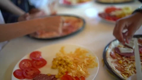 A  workshop for children on cooking pizza in an old wood-fired oven Stock Footage 277628714