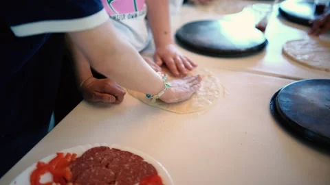 A  workshop for children on cooking pizza in an old wood-fired oven Stock Footage 277628717
