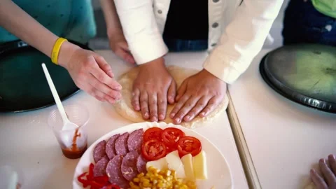 A  workshop for children on cooking pizza in an old wood-fired oven Stock Footage 277628725