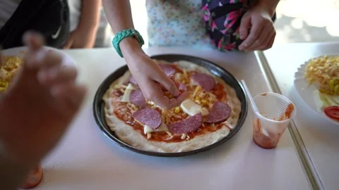 A  workshop for children on cooking pizza in an old wood-fired oven Stock Footage 277628734