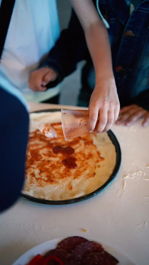 A  workshop for children on cooking pizza in an old wood-fired oven Stock Footage 277628741
