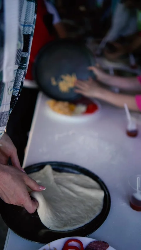 A  workshop for children on cooking pizza in an old wood-fired oven Stock Footage 277628744