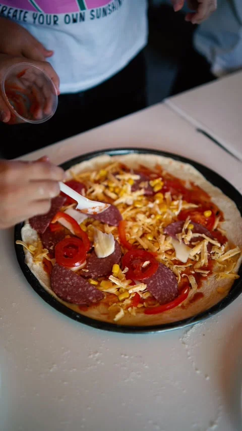 A  workshop for children on cooking pizza in an old wood-fired oven Stock Footage 277628752