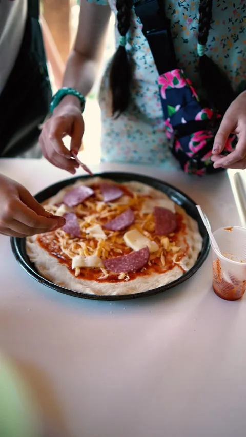 A  workshop for children on cooking pizza in an old wood-fired oven Stock Footage 277628759