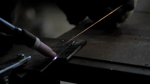 In the workshop. Close-up. Slow motion. Argon-arc welding Stock Footage 128998130