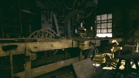 Workshop featuring oversized wheels and layered mechanical decorations Stock Footage 341819129