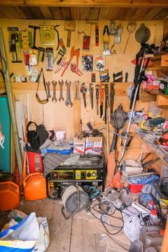 Workshop full of various tools and equipment for home improvement and Stock Photos