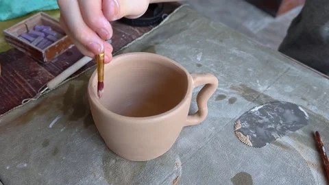 Workshop for kids. Children learning how to use clay for making dishes. Stock Footage 292680159