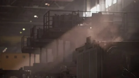 Workshop of a metallurgical plant, the rays of the sun break through, the machin Stock Footage 172227010