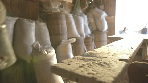 Workshop poor boy. A young man teaches old hand tools with box Stock Footage 56815339