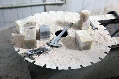 Workshop on processing of stone. Tools and workpieces Stock Photos