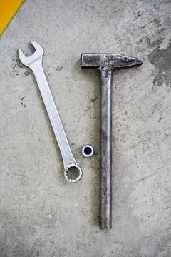 Workshop Setting With Hand Tools And Oil Stains, Closeup View Of Tools On Foto stock