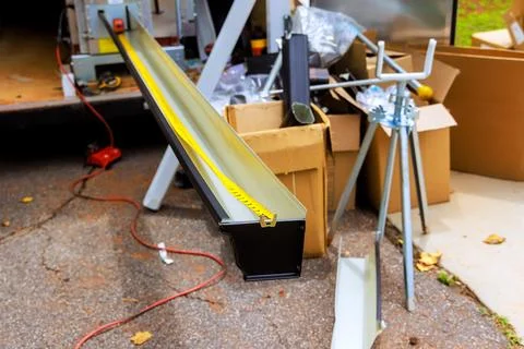 Workshop setting with tools materials for assemble gutter channels Stock-Fotos