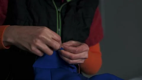 A workshop for sewing clothes. A seamstress. Stock Footage 238384109