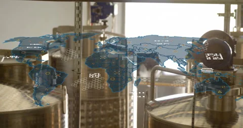 Workshop tanks receiving data-driven world map overlay fading in, showing global Stock Footage 310826017