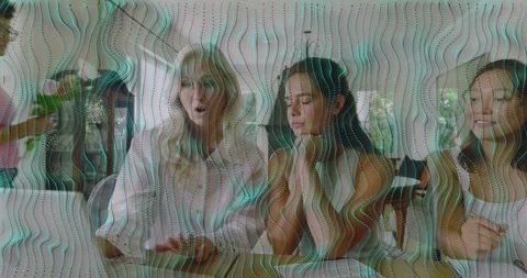 Workshop team noting presenter carrying bouquet and examining stems while Stock Footage 317733787