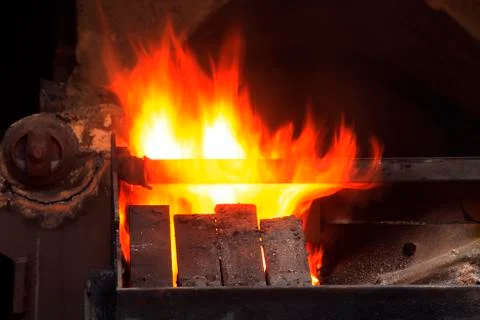 The workshop welder cuts metal Stock Photos