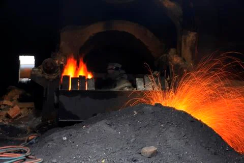 The workshop welder cuts metal Stock Photos