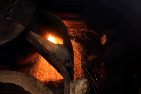 The workshop welder cuts metal Stock Photos