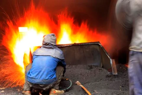 The workshop welder cuts metal?? Stock Photos