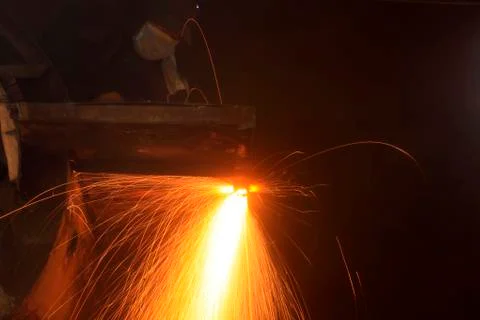 The workshop welder cuts metal?? Stock Photos