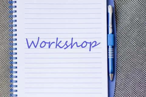 Workshop write on notebook Stock Photos