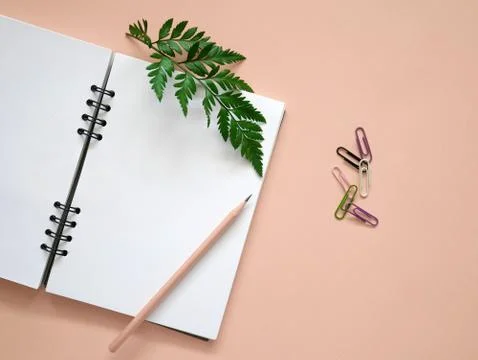 Workspace with blank notebook, pencil Stock Photos