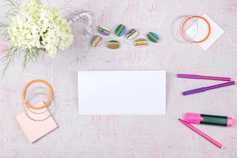 Workspace with computer, bouquet Hydrangeas, clipboard. Women's fashion acc.. Stock Photos