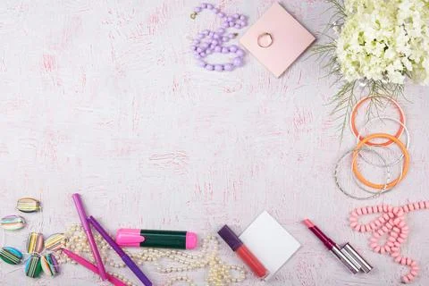 Workspace with computer, bouquet Hydrangeas, clipboard. Women's fashion acc.. Stock Photos