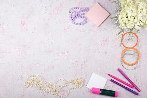 Workspace with computer, bouquet Hydrangeas, clipboard. Women's fashion acc.. Stock Photos