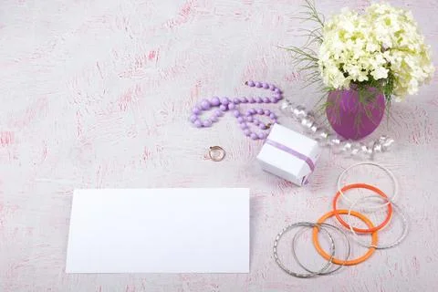 Workspace with computer, bouquet Hydrangeas, clipboard. Women's fashion acc.. Stock Photos