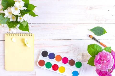  Workspace of creative worker Desk of creative worker. Paints, brush and f... Stock Photos