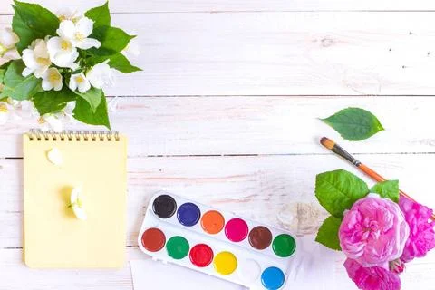  Workspace of creative worker Desk of creative worker. Paints, brush and f... Stock Photos
