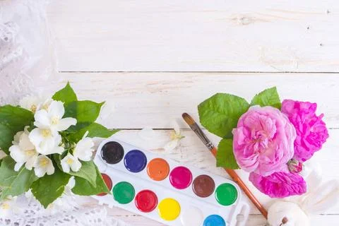  Workspace of creative worker Desk of creative worker. Paints, brush and f... Foto stock