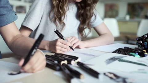 Workspace designer. White sheet of paper, pencils, markers, felt-tip pens. Stock Footage 64583363