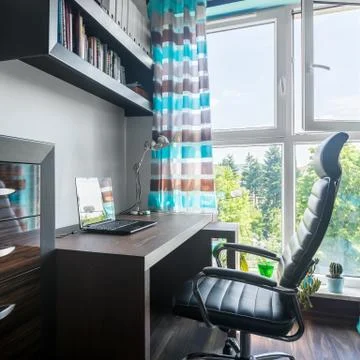 Workspace near window Stock Photos