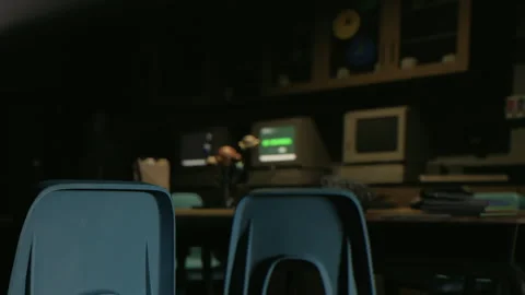 Workspace with old computers and chairs in dim light during evening Stock Footage 343498963