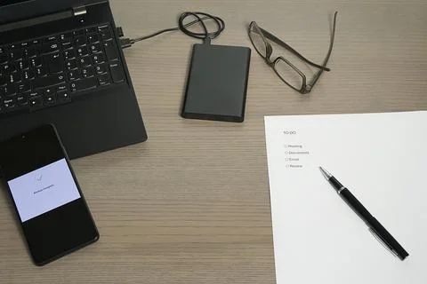 Workspace Organization with To-Do List and Smartphone Stock Photos