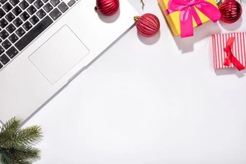 Workspace with Red baubles and tree branches. Stock Photos
