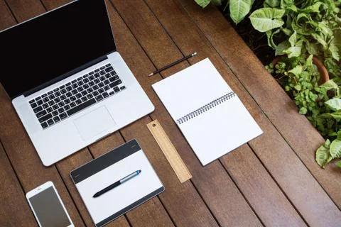 Workspace relaxing chill out work for office and design laptop smartphone pen Fotos Stock