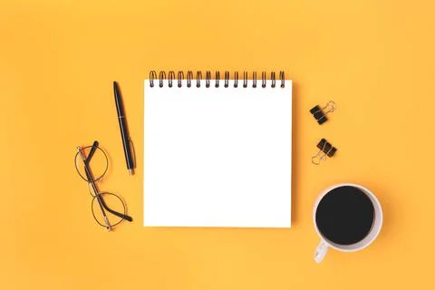 Workspace with square notepad mockup, stationery and coffee cup Stock Photos