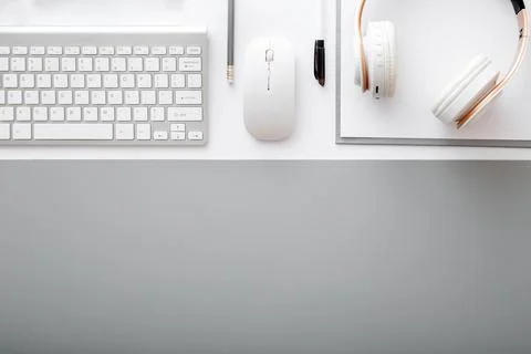 Workspace top view. Office table desk with keyboard, headphones mouse office Stock Photos