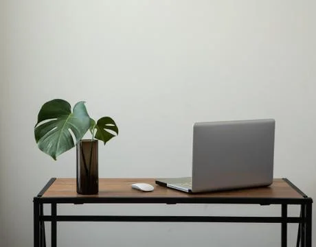 Workspace white wall minimal with notebook and desk Stock Photos