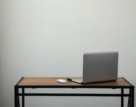 Workspace white wall minimal with notebook and desk Stock Photos