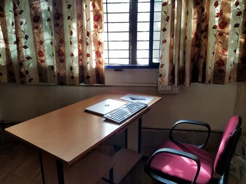 Workspace by window during lockdown or covid times, Dharwad, Karnataka, India Stock Photos