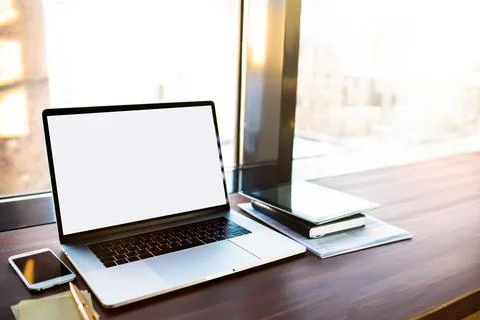 Workstation with open pc laptop computer with empty mock up copy space screen Stock Photos